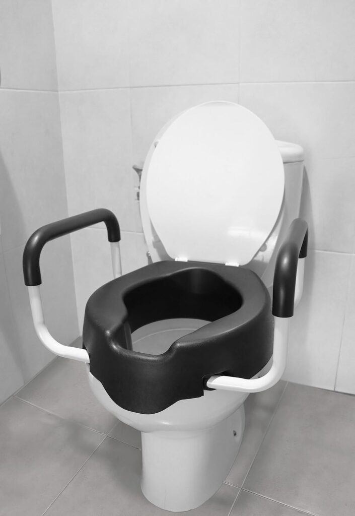 KMINA - Toilet Seat Risers for Seniors with Handles 4 inch, Soft Raised Toilet Seat with Lid, Handicap Toilet Seat Riser with Bars, Elevated Toilet Seat, Black High Toilet Seat for Seniors